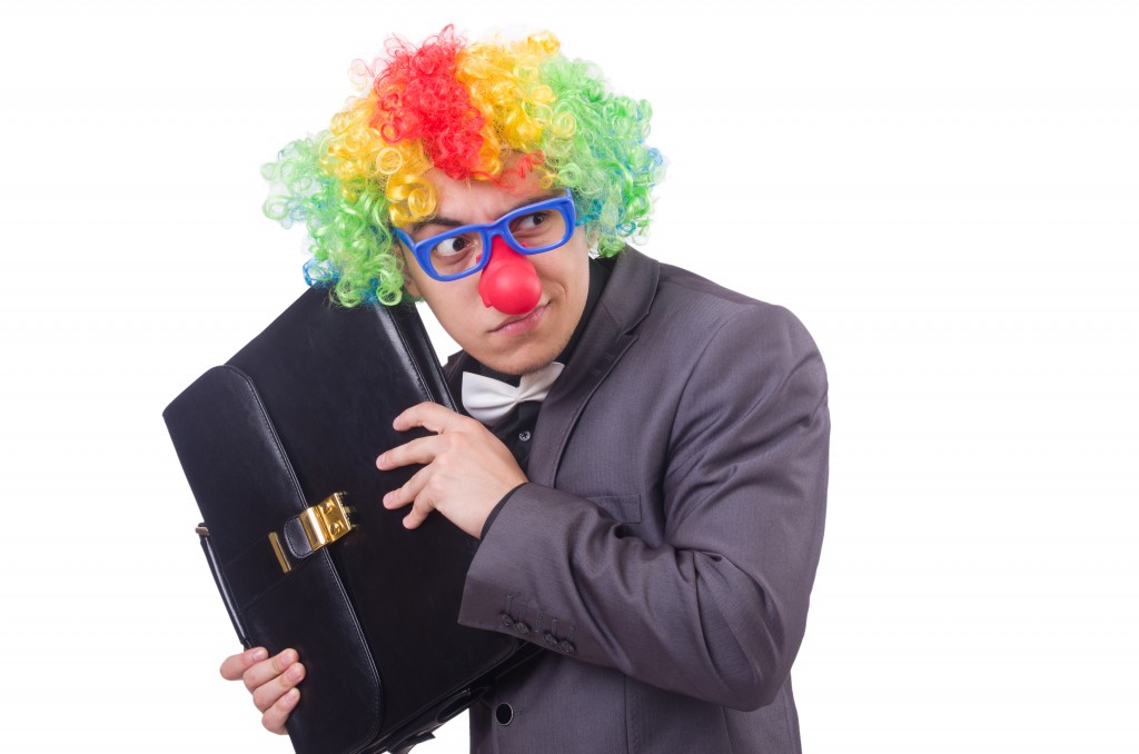 Clown businessman isolated on white